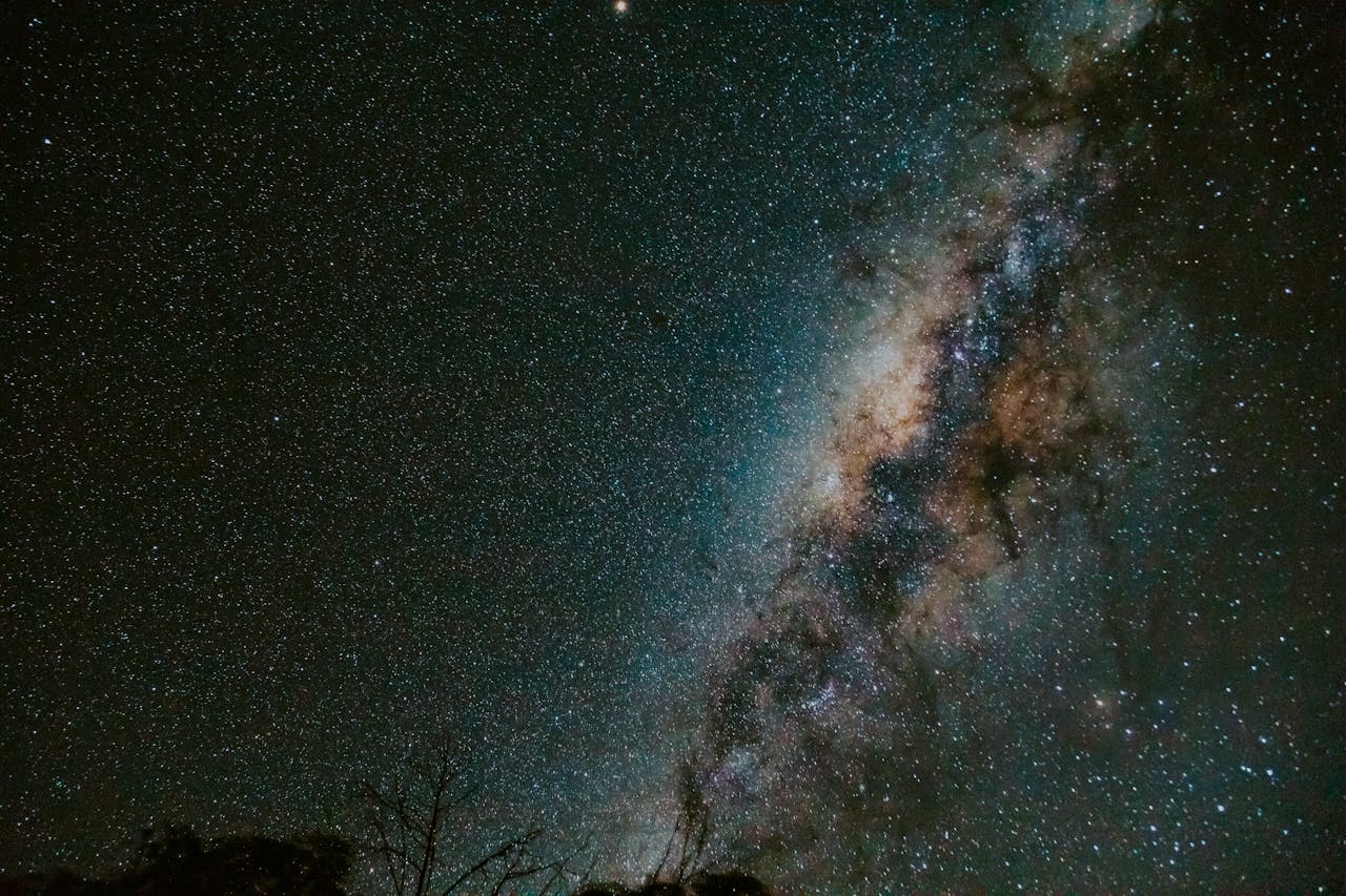 services-01 A breathtaking view of the Milky Way galaxy in a clear, starry night sky.